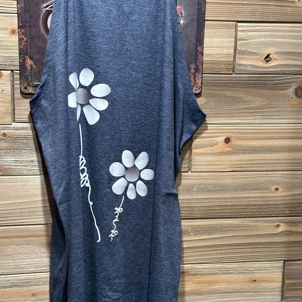 Blue Sleeveless Dress with White Floral Design